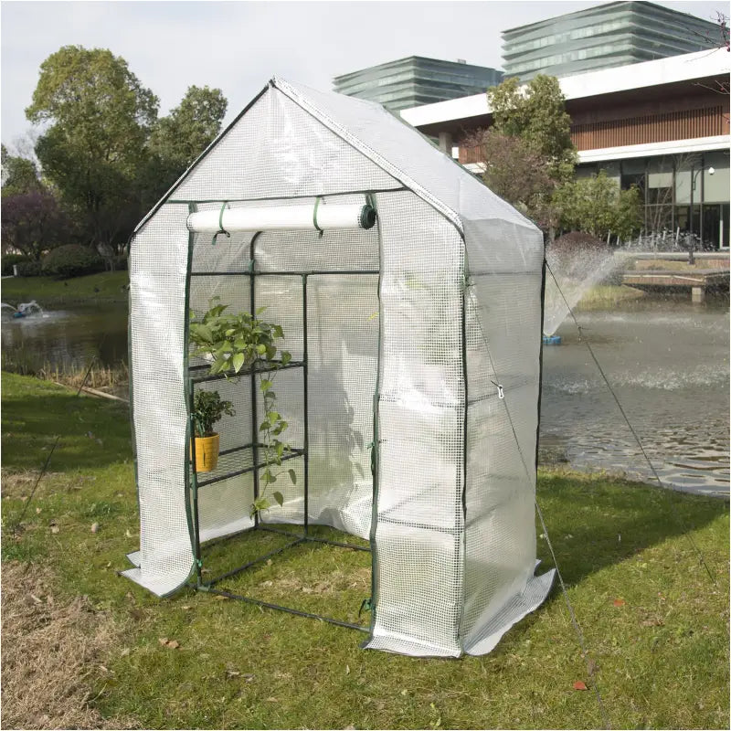 BukkitBow – Polytunnel Tuinkas – Winterproof Tunnel voor Groenten Teelt – Compacte Tuinkas met Groot Luik en 3 Bloemen Planken - 143x73x195CM